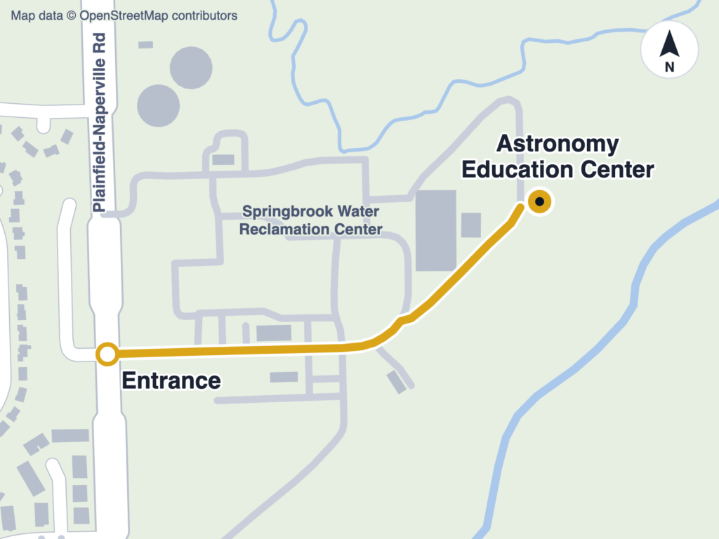 Map of the route to the Astronomy Education Center: from the entrance on Plainfield-Naperville Rd, follow the entrance road east, fork left at its end, and follow the curve northeast to the AEC on the far eastern side of the Springbrook grounds.