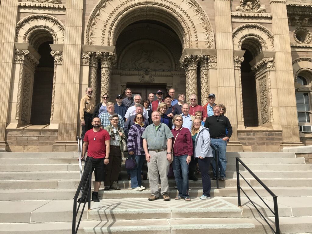 A group of club members on the front steps of Yerkes Observatory